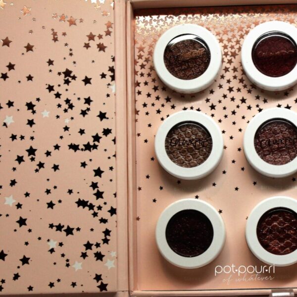 open the lid and there are stars and six shades with their own pots and lids that are see through