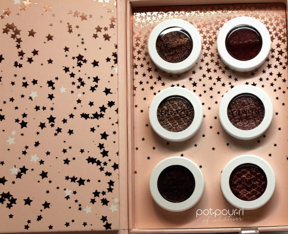 open the lid and there are stars and six shades with their own pots and lids that are see through