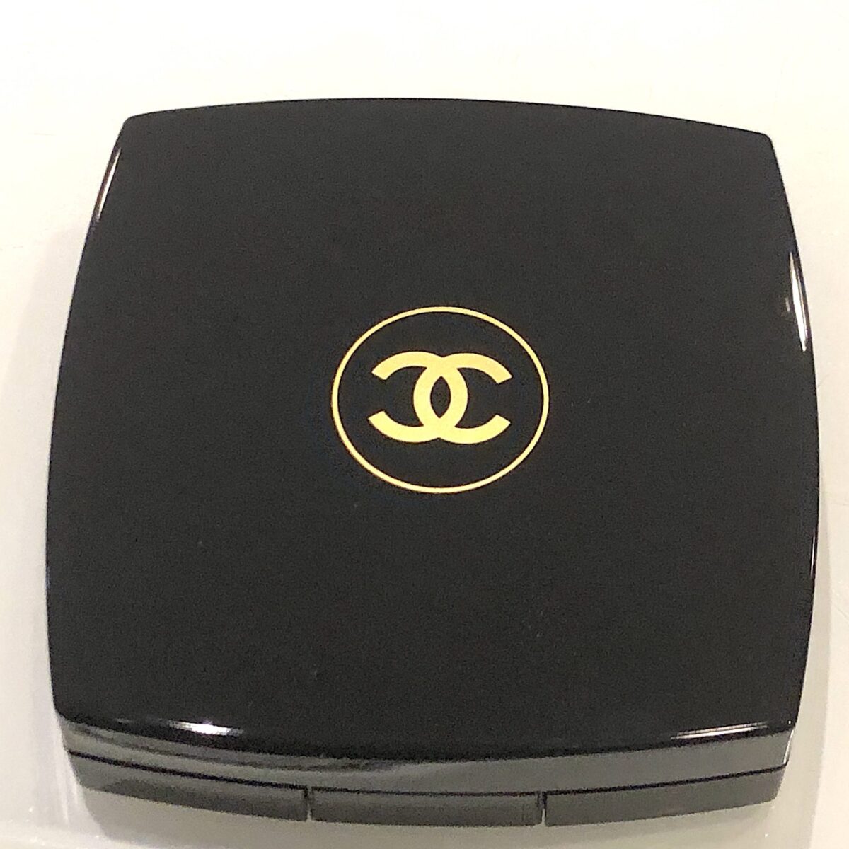 CHANEL'S CLASSIC COMPACT WITH GOLD DOUBLE C'S