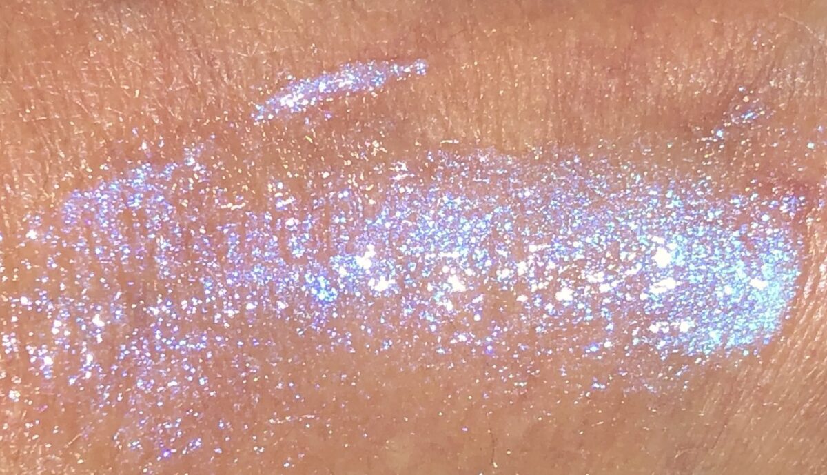 SWATCH CRYSTAL CLEAR BEFORE RUBBED INTO SKIN IT LOOKS HOLOGRAPHIC
