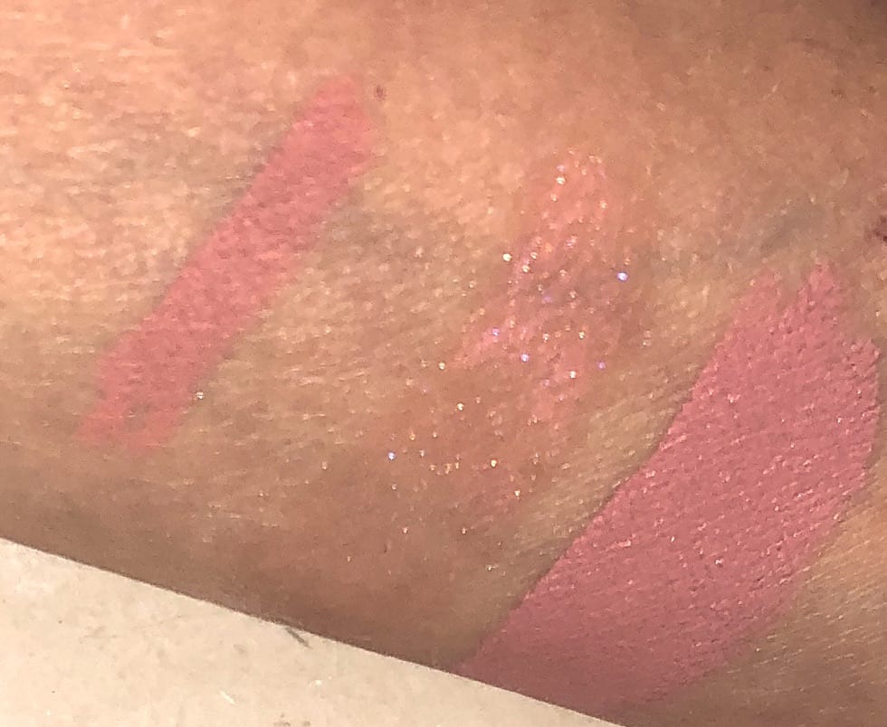 SWATCHES OF THE DIVINE ROSE LIP TRIO, L TO R- BUFF LIP LINER, LUST GLOSSIN PEACH PERVERSION, AND MATTE TRANCE LIPSTICK IN CHRISTY