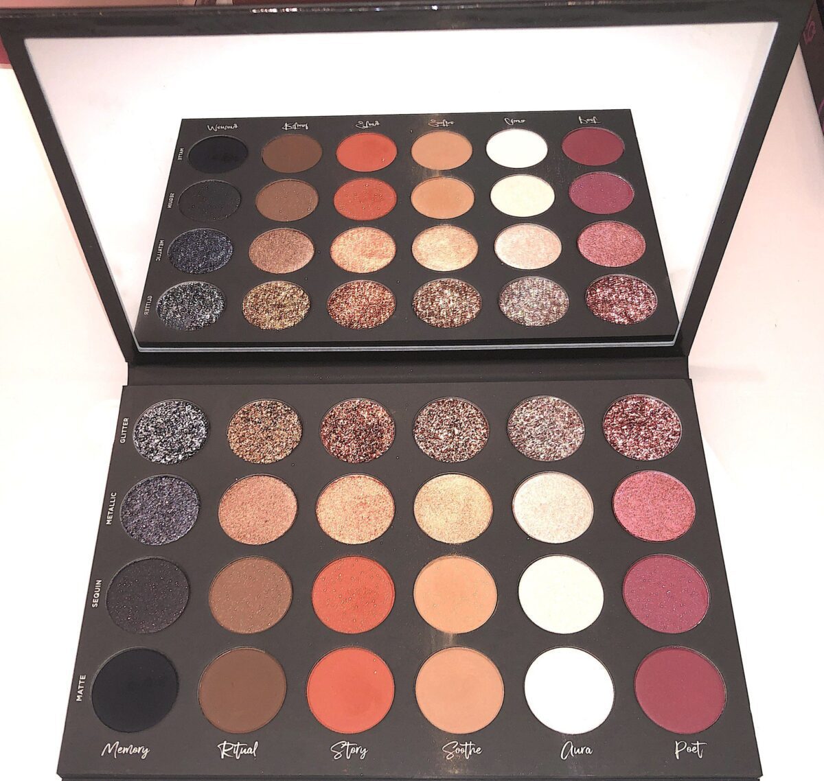 TATI'S FIRST EYESHADOW PALETTE INSIDE, THERE IS A LARGE MIRROR AND 24 EYESHADOW SHADES
