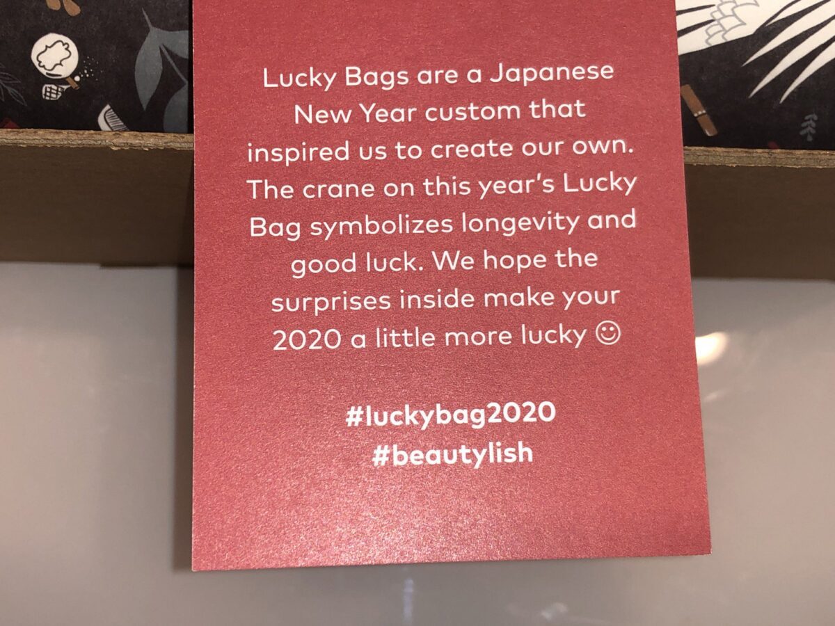 THE OPPOSITE SIDE OF THE TAG TELLS YOU ALL ABOUT LUCKY BAG