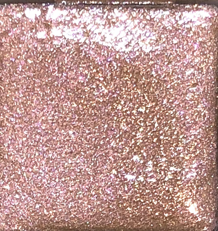 the shade is champagne rose luminizer