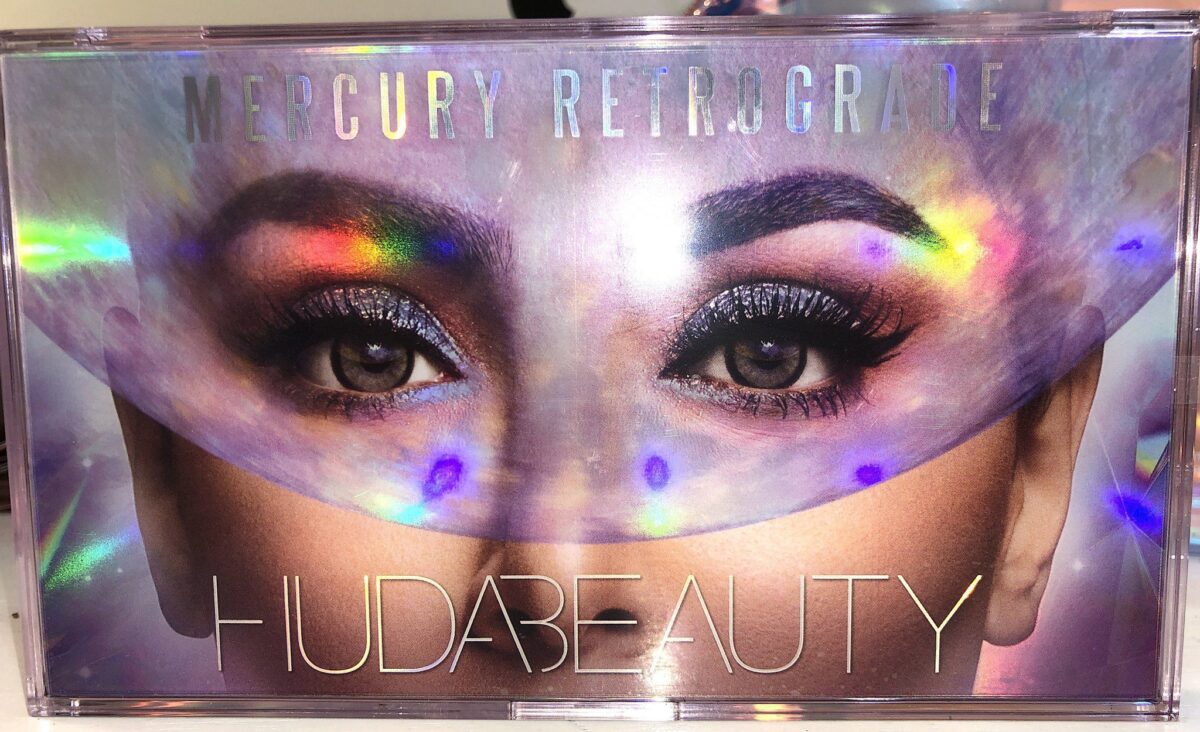 THE OUTER BOX OF THE HUDA MERCURY RETROGRADE COLLECTION EYESHADOW PALETTE
