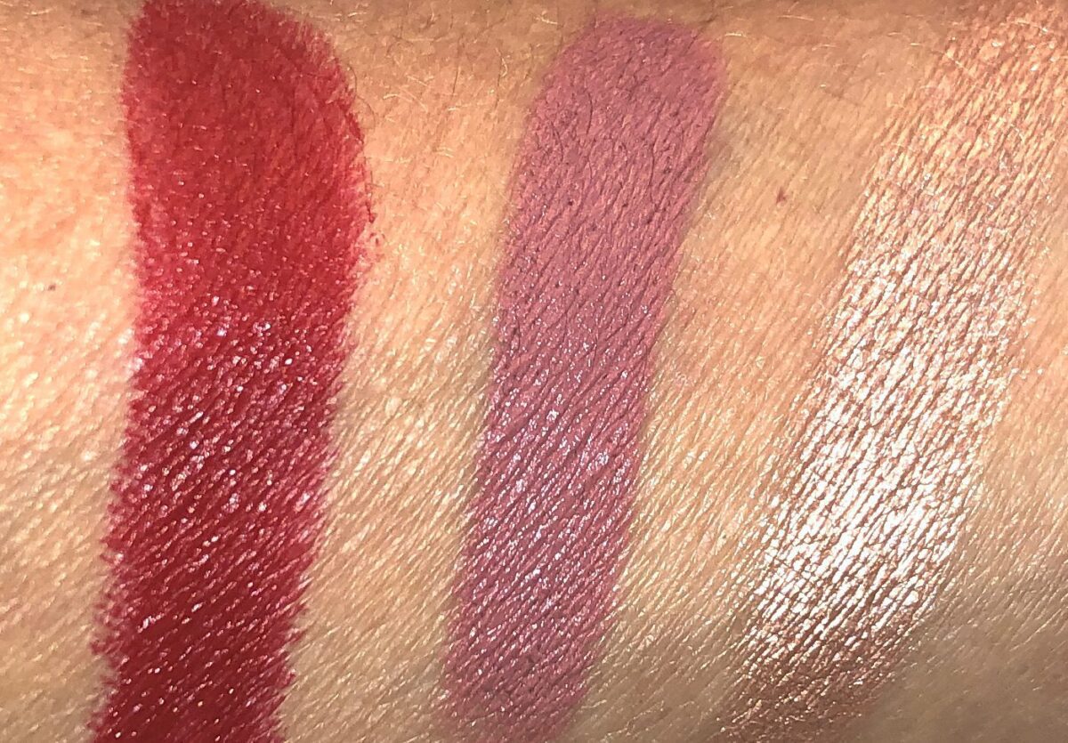 L TO R: ELSON LIPSTICK, OMI LIPSTICK, CHAMPAGNE GOLD HIGHLIGHTER SWATCHES