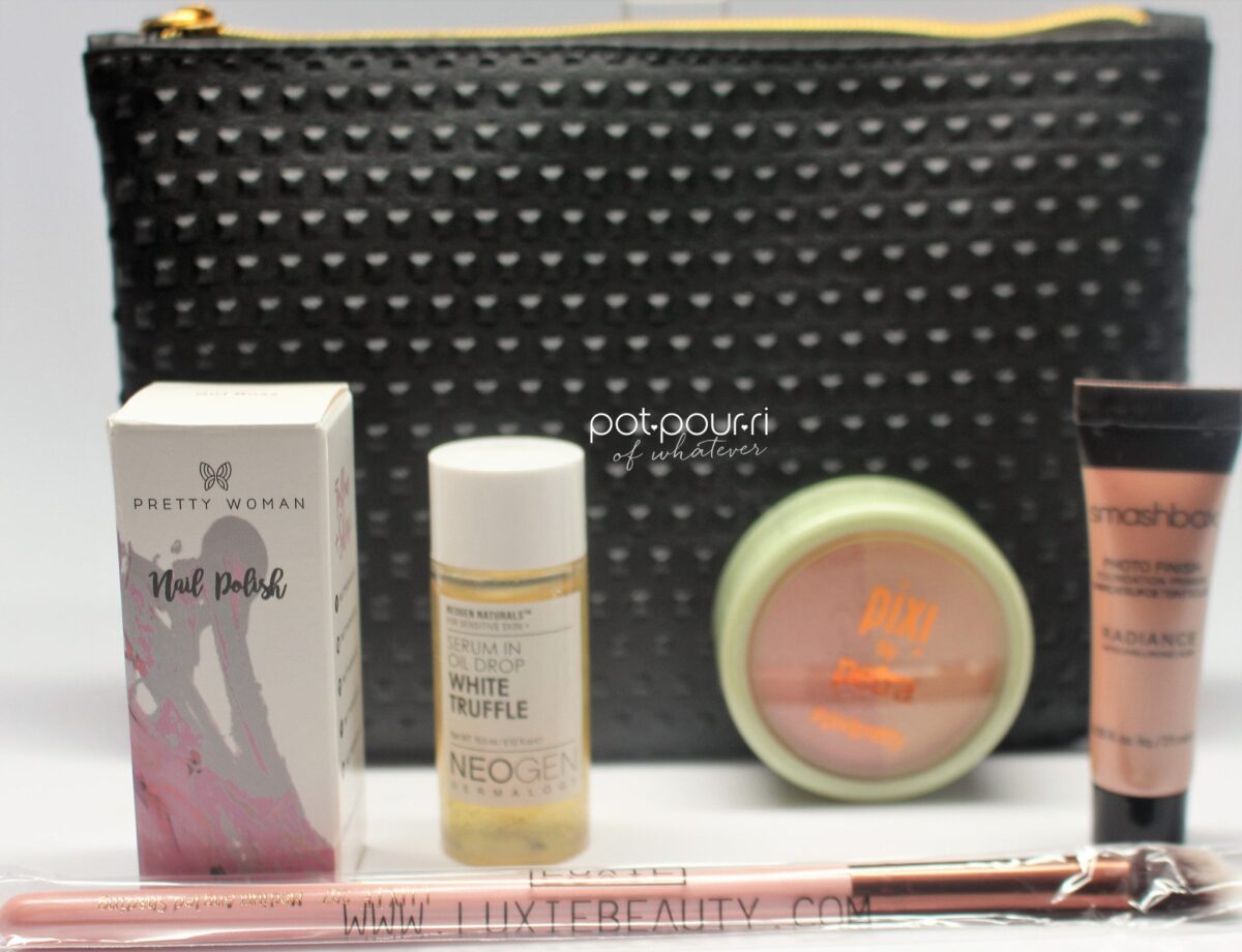 The products arrive inside of the Ipsy Cosmetic Bag