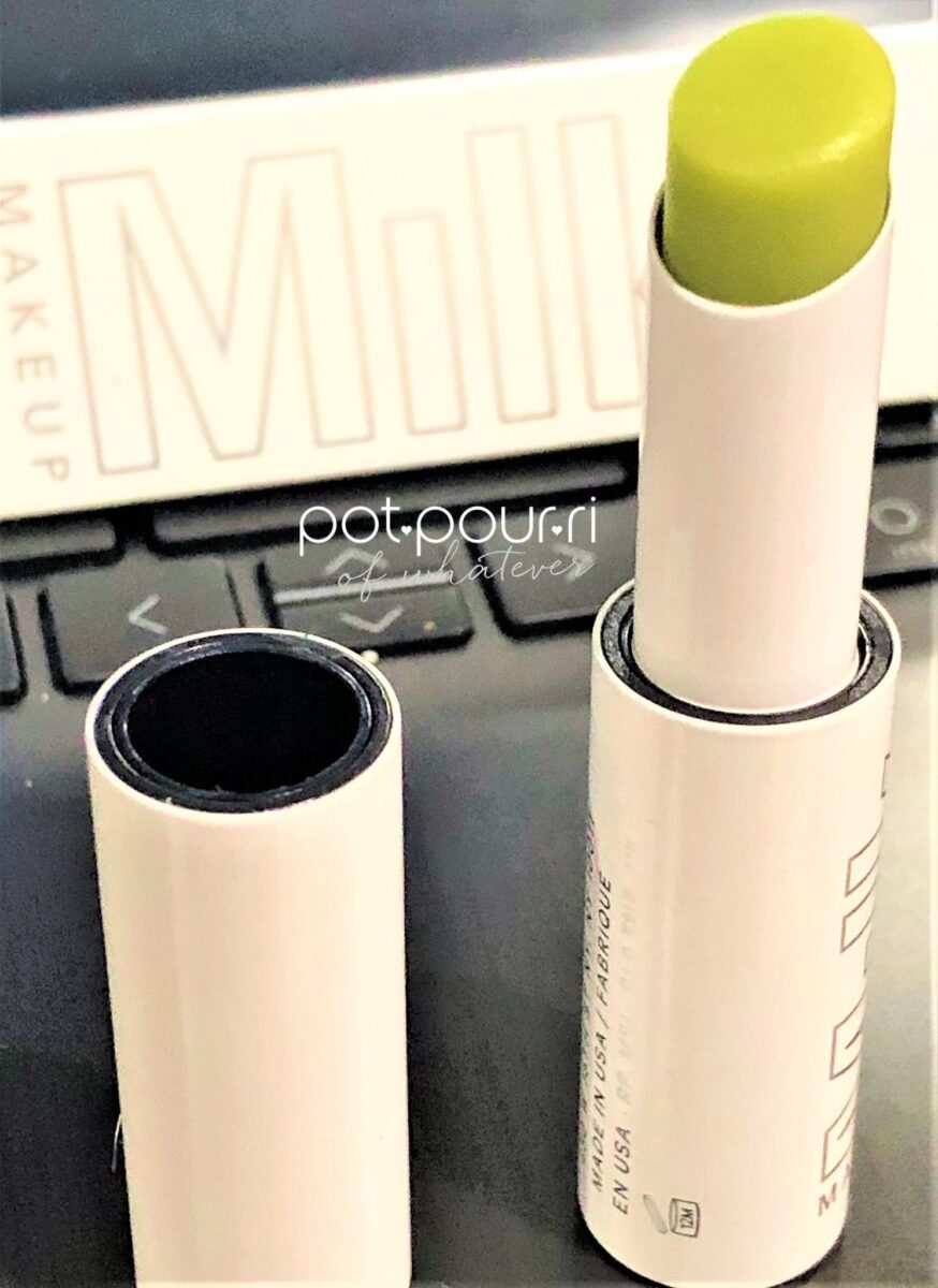 MILK MAKEUP KUSH LIP BALM IN GREEN DRAGON TURNS TRANSLUCENT WHEN APPLIED TO YOUR LIPS