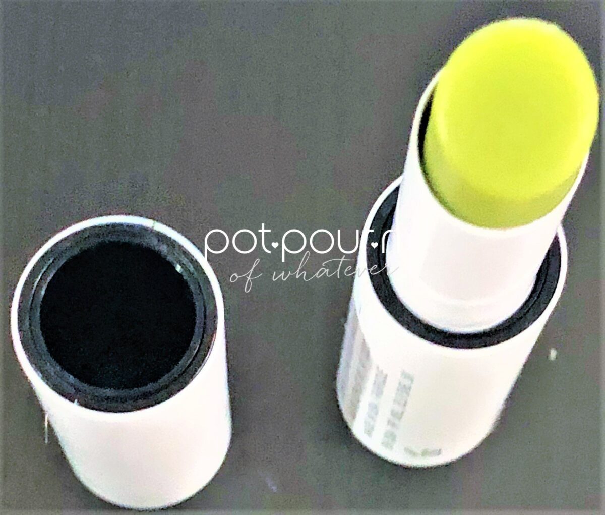 THE BLACK CIRCLE, AND THE BLACK INSIDE THE LID ARE THE MAGNETS FOR MILK MAKEUP KUSH LIP BALM MAGNETIC CLOSURE