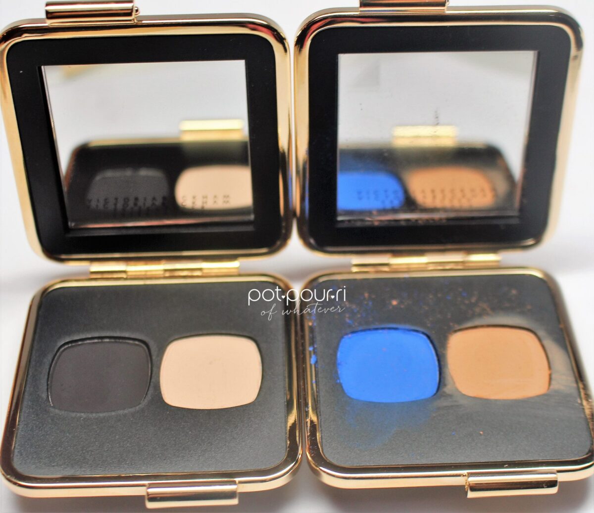 the two palettes I own are the black/cream and the bright blue and camel duos