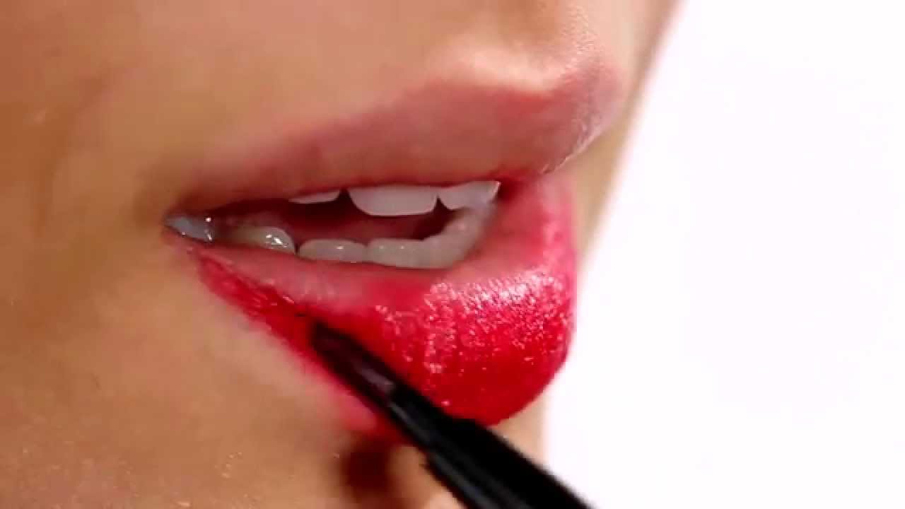 camera-using-lipstick-brush-press0color-into-lips-maximum-control-coverage