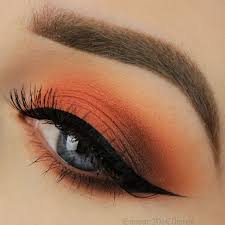 Orange eye shadow for a May makeup look
